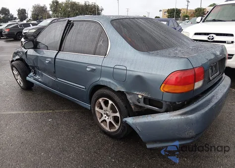 1998 Honda Civic Lx z USA, uszkodzony, nr VIN JHMEJ6677WS003967